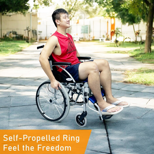 Customer testing a lightweight foldable wheelchair in a Singapore showroom