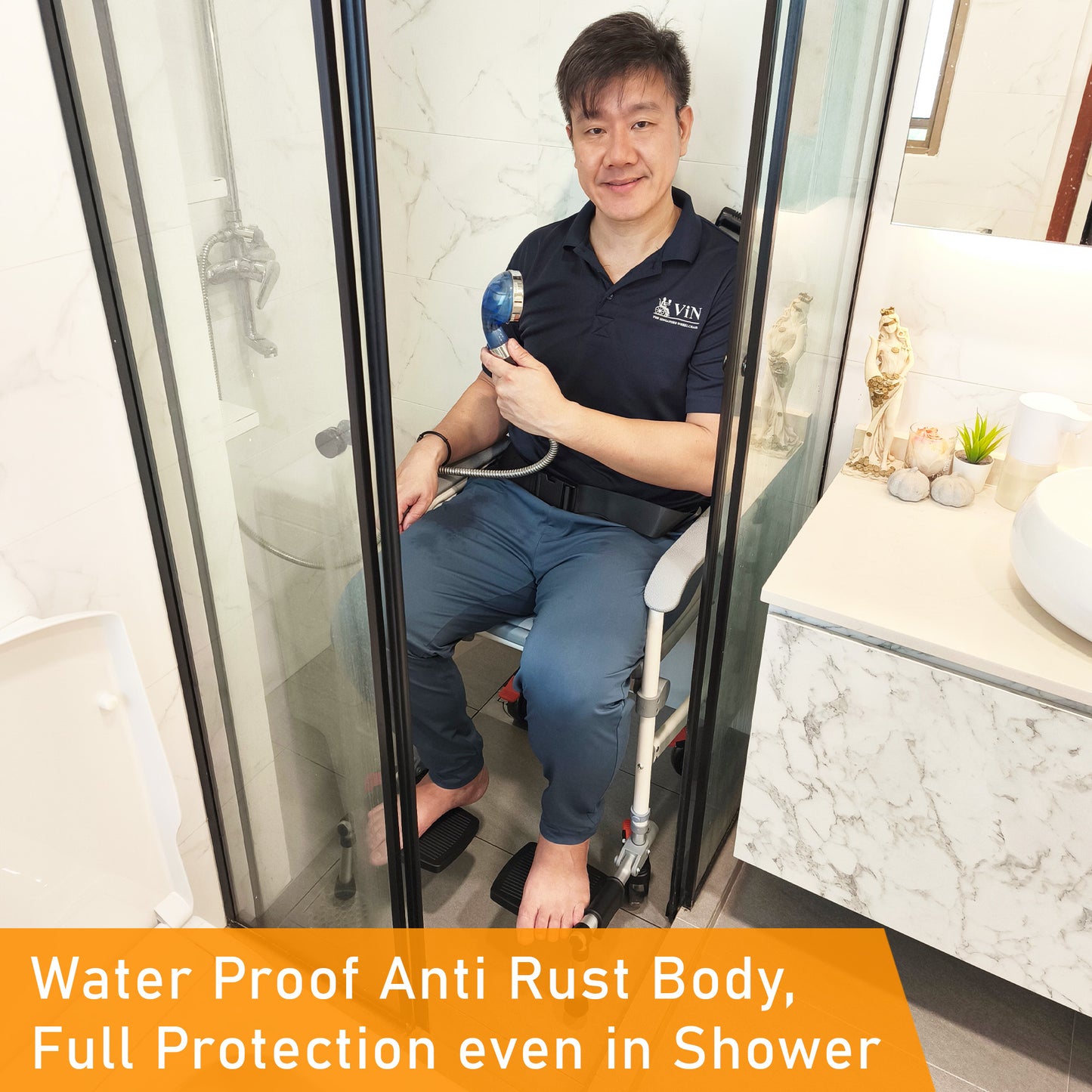 ViN-K06 aluminum shower commode chair, foldable and detachable 3-in-1 toilet chair for indoor use, wheelchair and shower use, with 4 full-lock caster wheels, safety belt, anti-tip device, flip-up push handles and footrests, removable bucket, and cushioned seat.